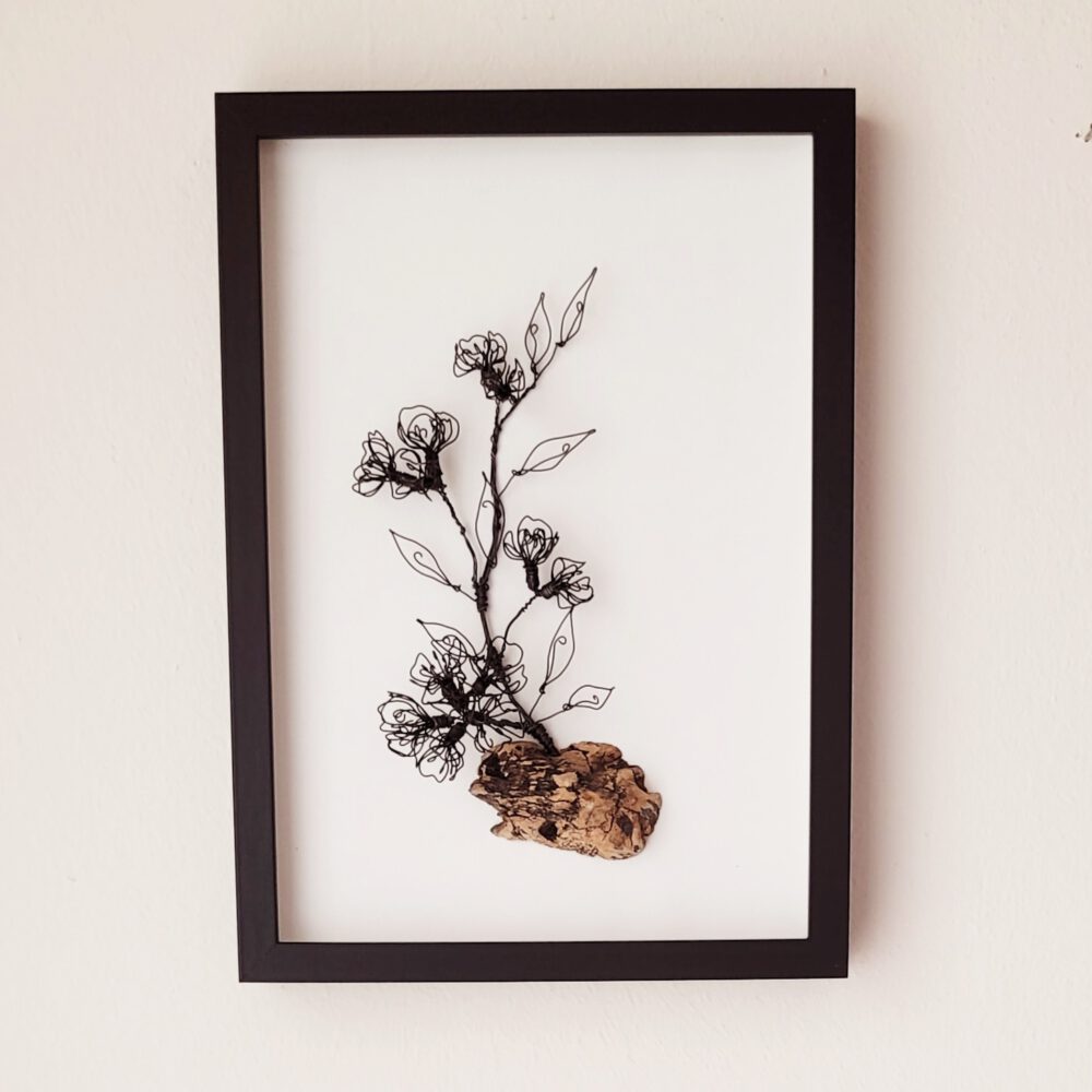 20260114_153521 1 Kirschblütenzweig auf Treibholz