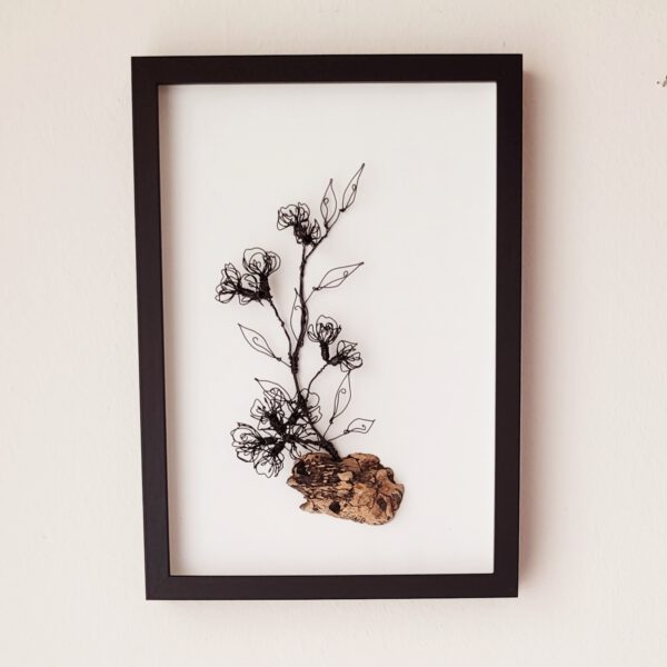 20260114_153521 1 Kirschblütenzweig auf Treibholz